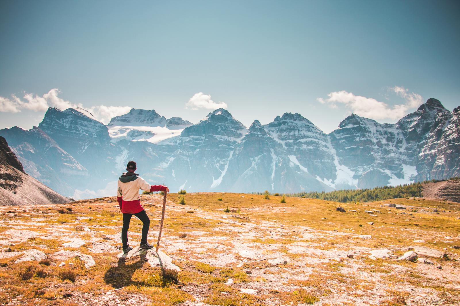 person hiking mountain trail