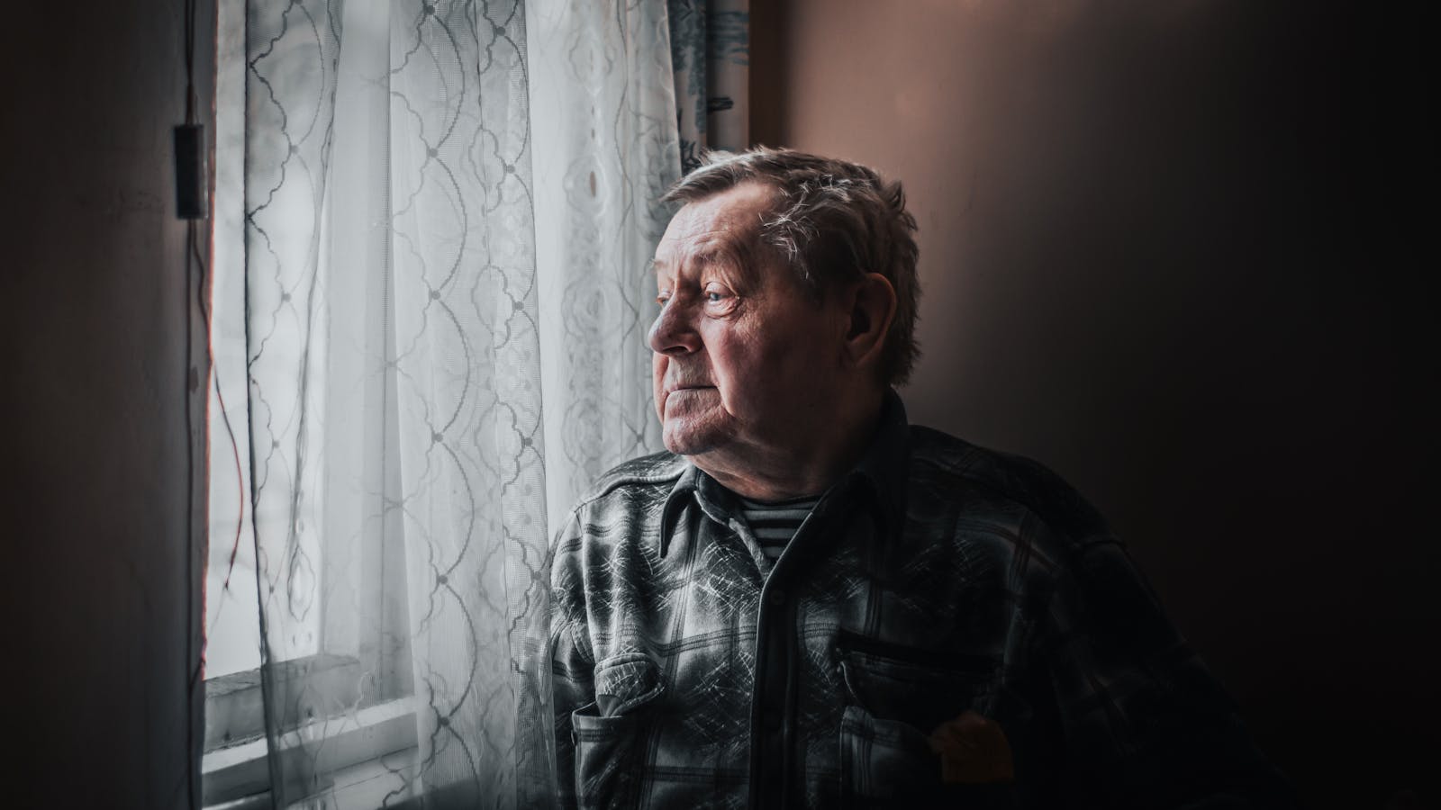 older man thinking alone