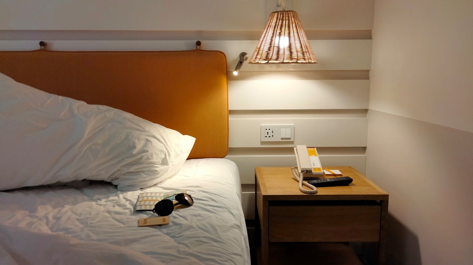The person who keeps a glass of water, a charger, and a book in the same place every night isn't always being particular, they're making mornings feel less unpredictable