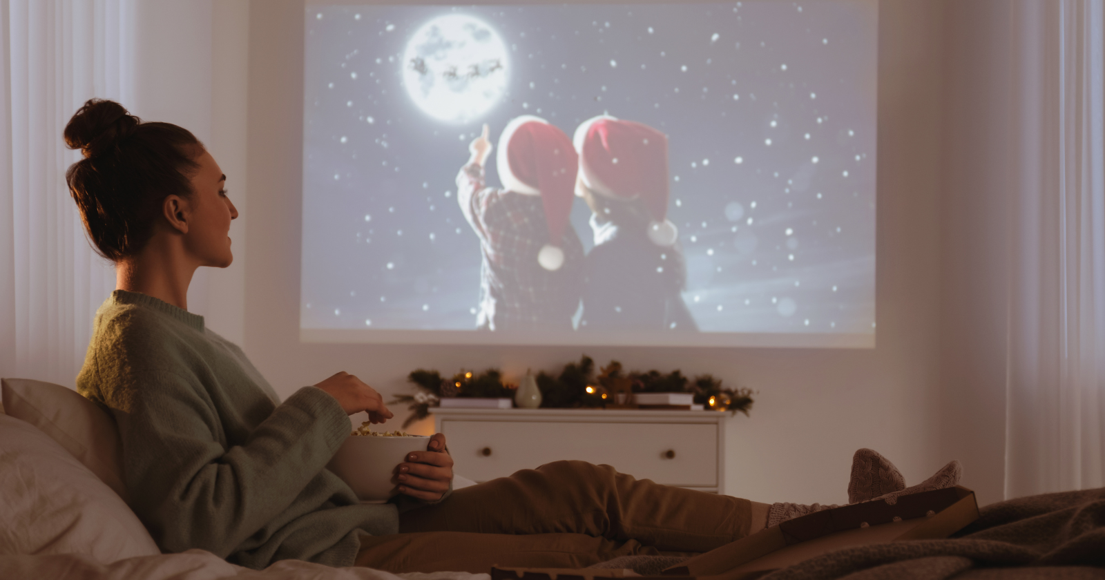 Adults who rewatch the same old films every winter aren't avoiding new ones, they're returning to a season of their life when the world felt smaller, the stakes felt softer, and the people on the couch beside them were still there