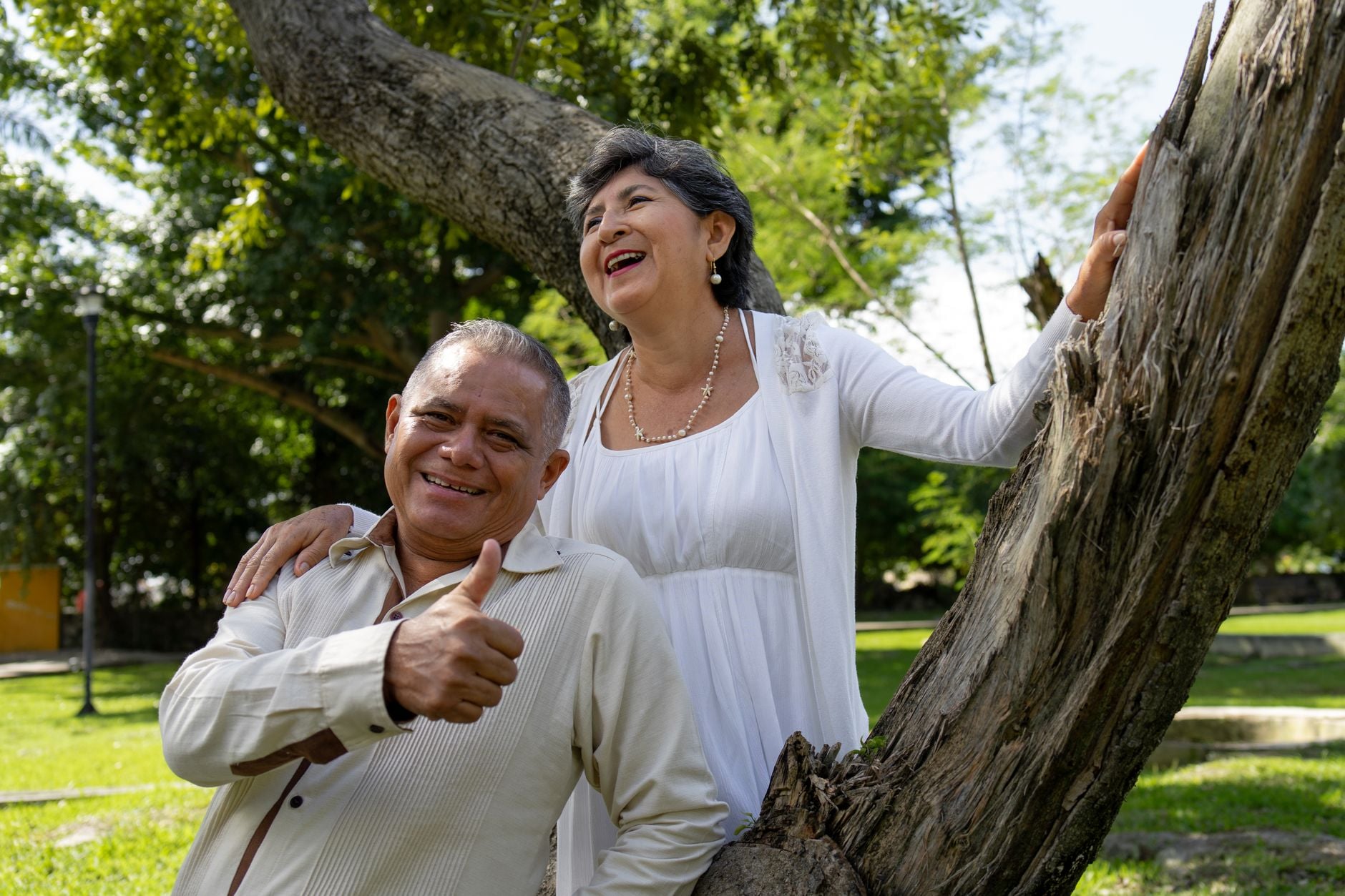 Representative older adult smiling outdoors