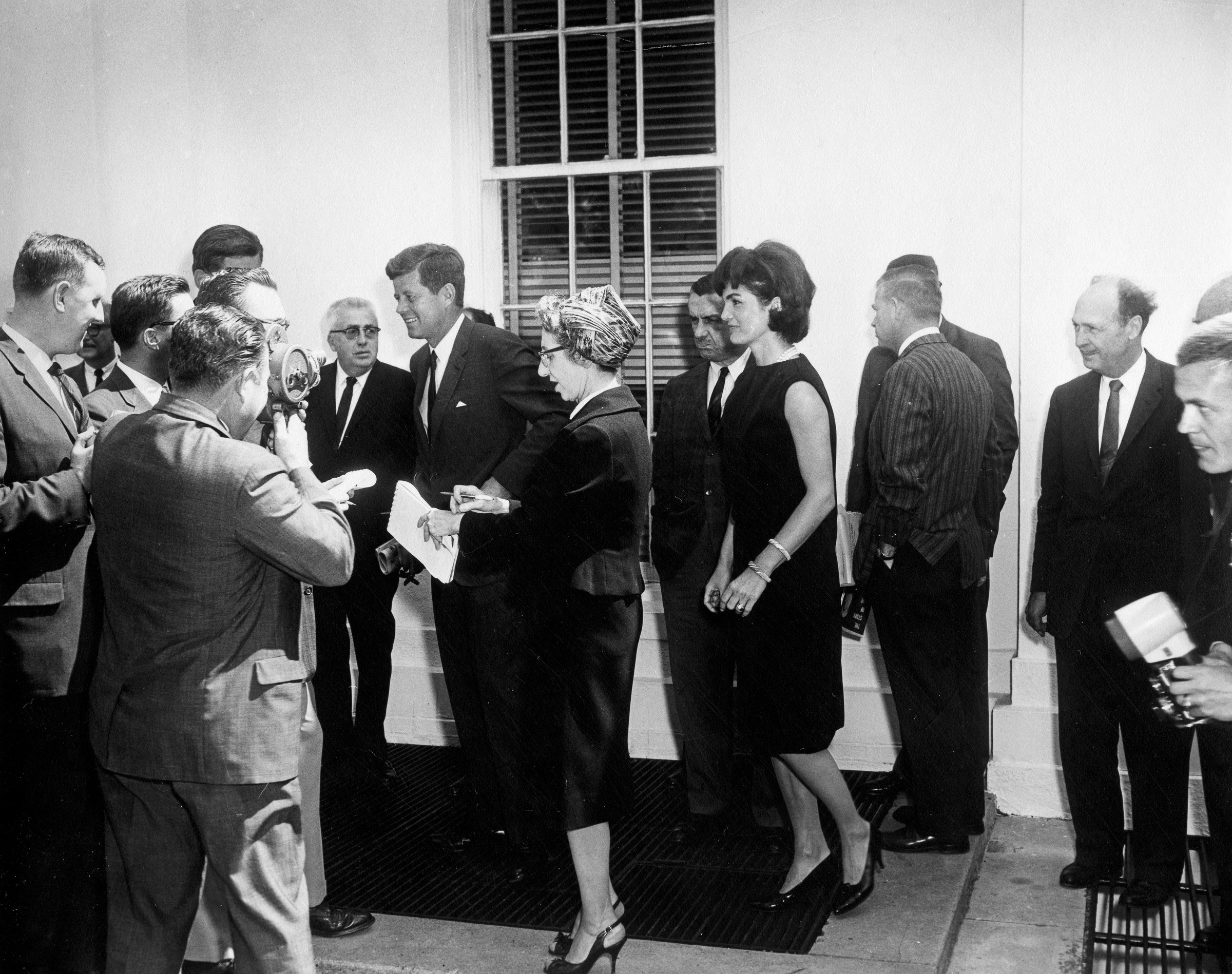 President John F. Kennedy and First Lady Jacqueline Kennedy bid farewell to Prince Rainier III and Princess Grace of Monaco at the White House, 24 May 1961.